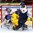 HELSINKI, FINLAND - JANUARY 2: Sweden's Jakob Forsbacka Karlsson #12 collides with Slovakia's Patrik Maier #16 in front  of Adam Huska #30 during quarterfinal round action at the 2016 IIHF World Junior Championship. (Photo by Matt Zambonin/HHOF-IIHF Images)

